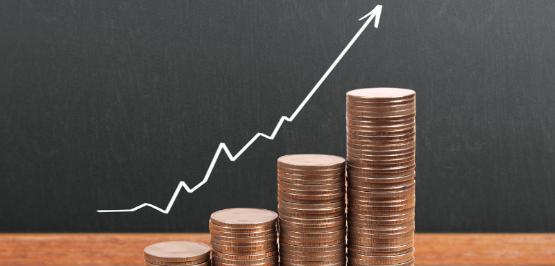 Gráfico de monedas en crecimiento.